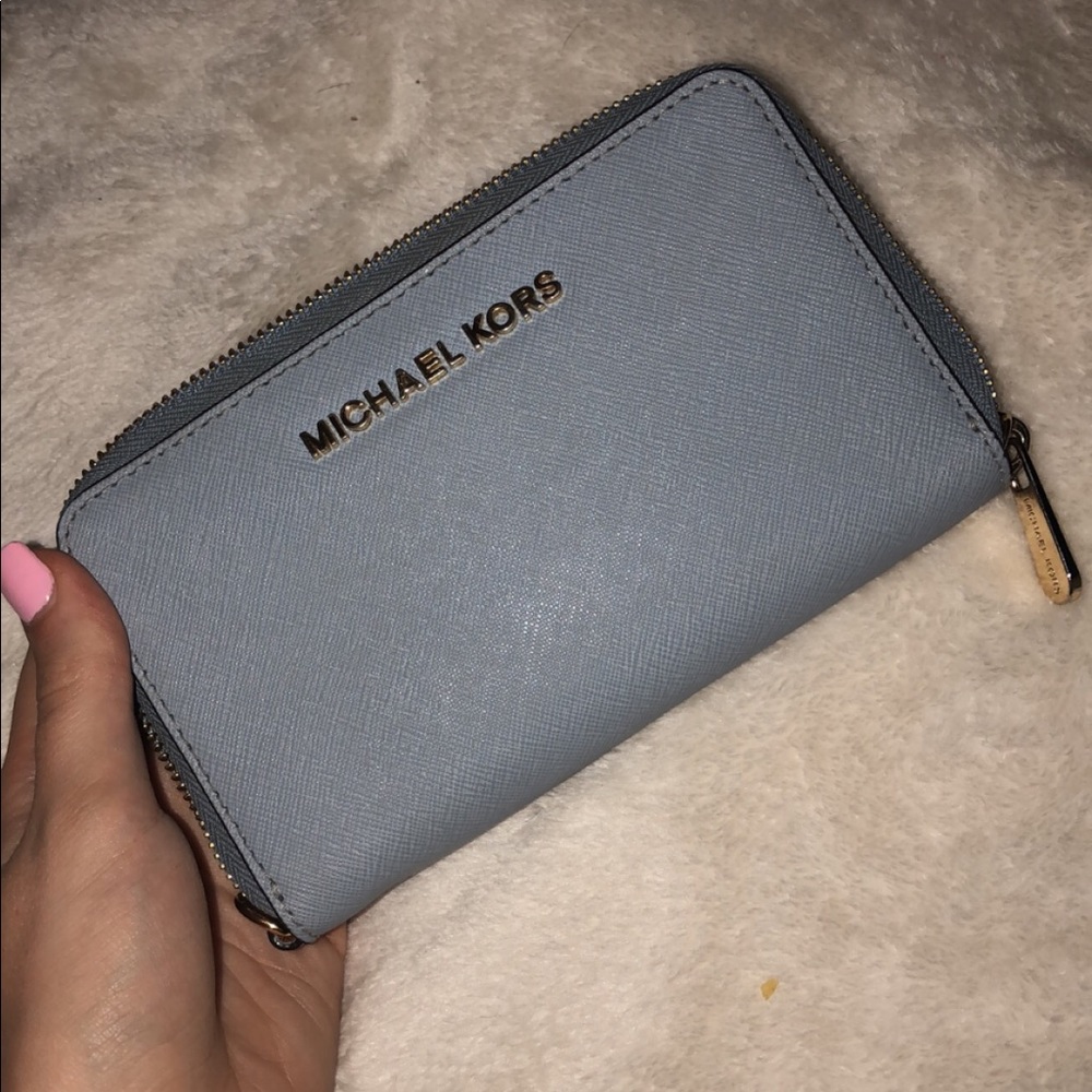 Micheal Koran’s wallet never been used before